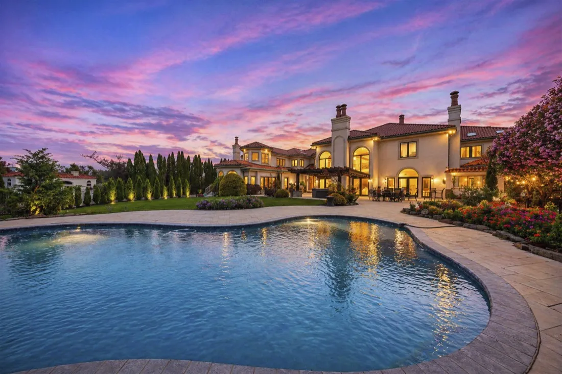 Thumbnail: Pool and back of house at The Hilltop Mansion